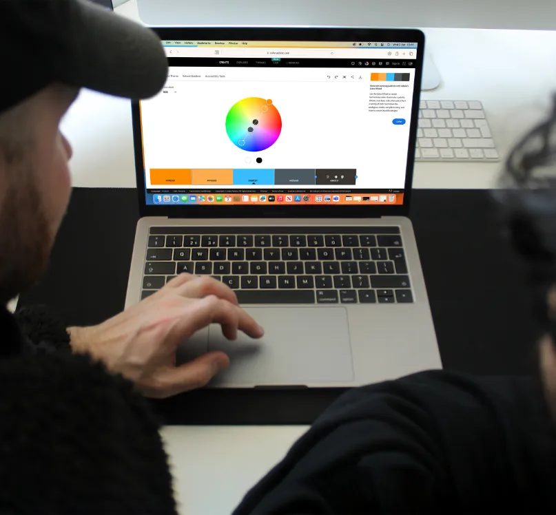Disr. creative agency team exploring colour theory on-screen during early concept phase